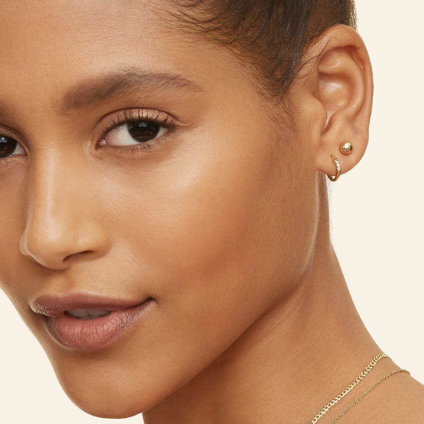 Petite Diamond Huggie Earrings (0.5ct. tw.) in 18K Gold
